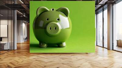 Eco-Friendly Savings - Green Piggy Bank on Matching Background Wall mural