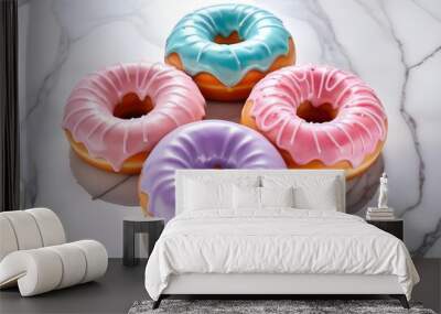 Colorful glazed donuts with a swirled pattern on a marble surface Wall mural