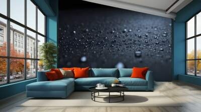 Raindrops on dark surface, macro Wall mural