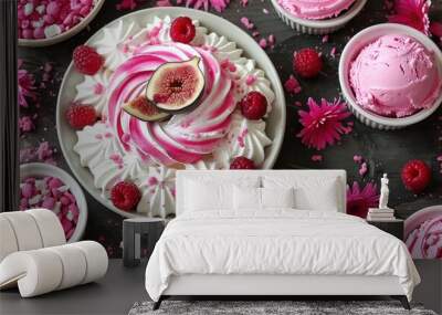   A close-up photo of a cake with raspberry frosting, surrounded by other desserts Wall mural