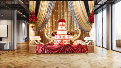 Elegant Indian wedding reception decor with cake and golden stage Wall mural