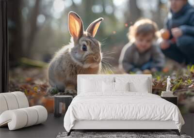 Little kid with cute easter bunny with easter eggs Wall mural