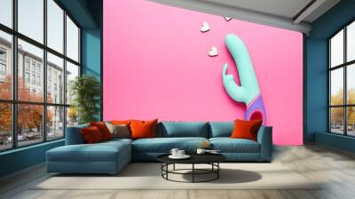 multi-colored sex toy, adult toy on a pink background Wall mural