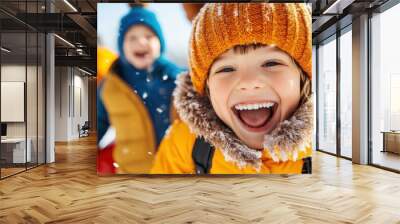 Happy children playing in the snow, dressed in colorful winter clothing, smiling and enjoying the cold weather while their laughter fills the frosty air. Wall mural