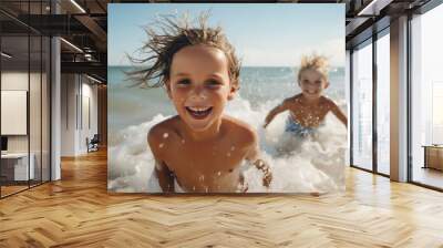 Joyful children splashing in ocean waves, enjoying a sunny beach day, capturing the essence of carefree summer fun and adventure. Wall mural