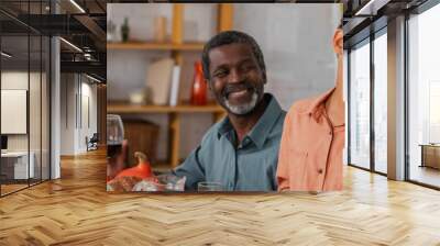 African american family looking at woman during thanksgiving celebration, banner Wall mural