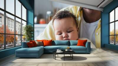 african american man with infant child in kitchen, banner Wall mural