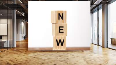 alphabet cubes making word news on wooden table, on white Wall mural