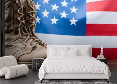 army boots near american flag on blurred background Wall mural