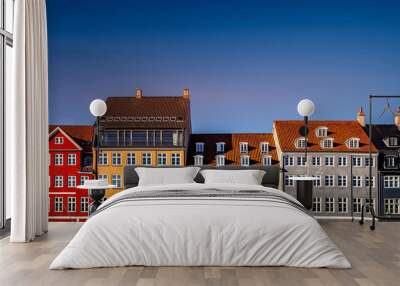 beautiful historical houses against blue sky at sunny day, copenhagen, denmark Wall mural