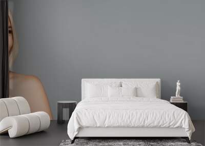 Blonde woman massaging face with jade roller isolated on grey, banner Wall mural