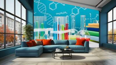 books, glass test tubes and flasks with colorful liquid on blue background with molecular structure Wall mural