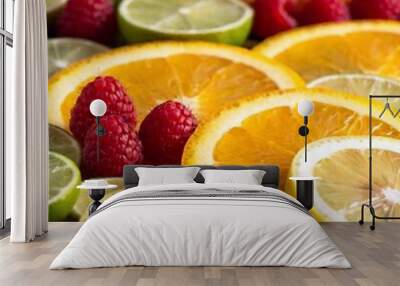 close-up of a mixed fruit display with slices of citrus fruits like oranges and lemons, and berries, using rack focus to emphasize one type of fruit while the others are blurred Wall mural