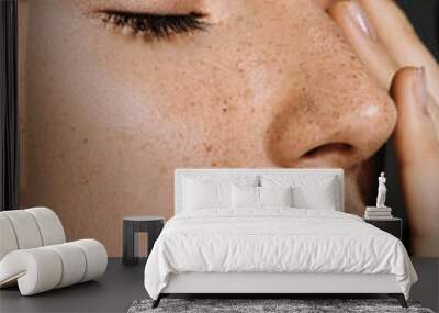 close up of beautiful tender woman with freckles on face isolated on grey Wall mural