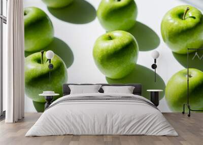 close up of green tasty apples on white. Wall mural