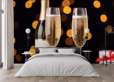 Close-up shot of a bottle of champagne with two glasses, with the bubbles in the glass in sharp focus and the bottle softly fading into the background, capturing the celebratory spirit of Valentine's Wall mural