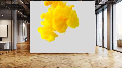 close up view of bright yellow paint splash in water isolated on gray Wall mural