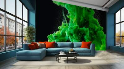 close-up view of green abstract paint explosion on black background Wall mural