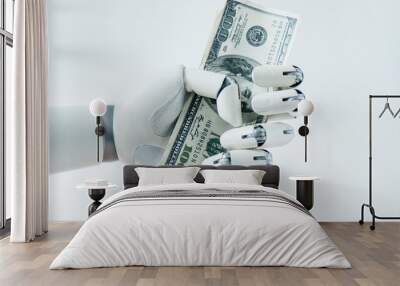 close-up view of robot holding dollar banknotes isolated on white Wall mural