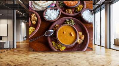 close up view of traditional asian food on wooden tabletop, sri lanka Wall mural