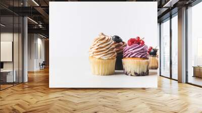 close up view of various sweet cupcakes isolated on white Wall mural