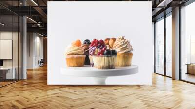 close up view of various sweet cupcakes on cake stand isolated on white Wall mural