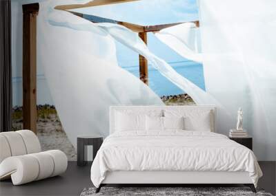 close up view of wooden decoration with white curtain lace, blue cloudy sky and river on background Wall mural