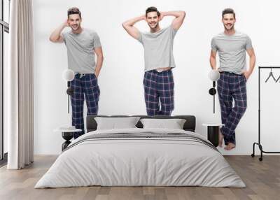 collage of handsome relaxing young man in pajama standing and smiling isolated on white Wall mural