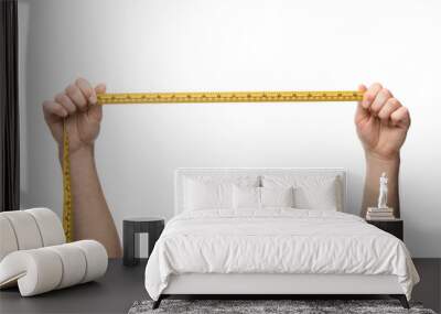 cropped view of man holding measuring tape isolated on white Wall mural