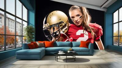 Female american football player in uniform Wall mural