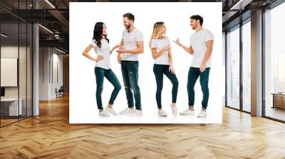 full length view of young couples standing and talking isolated on white Wall mural