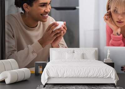 happy african american man looking at girlfriend with digital tablet during breakfast, banner. Wall mural