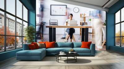 happy african american manager working at laptop in open space office, motion blur Wall mural