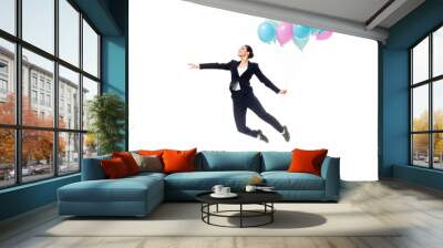 happy businesswoman levitating with festive balloons isolated on white Wall mural