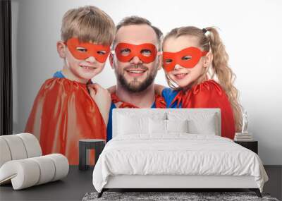 happy father and kids in superhero costumes smiling at camera isolated on white Wall mural