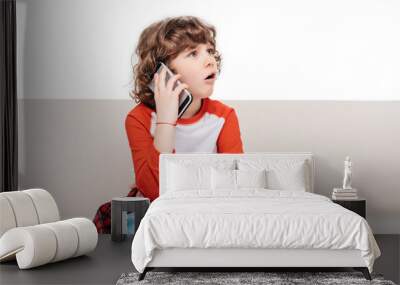 Kid using smartphone Wall mural