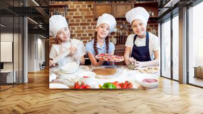 kids in chef hats making pizza together Wall mural