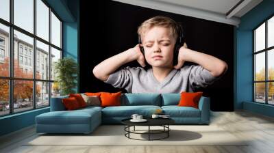 Little boy in headphones Wall mural