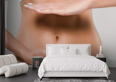 partial view of beautiful slim woman in underwear posing with hands near belly isolated on grey, panoramic shot Wall mural