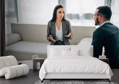 patient and therapist talking in doctors office Wall mural