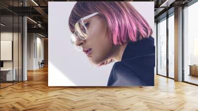 portrait of stylish girl with pink hair and glasses on white Wall mural