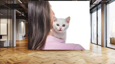 rear view of young woman with kitten on shoulder isolated on white background Wall mural