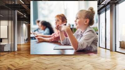 schoolgirls sitting in class Wall mural