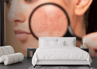 selective focus of man holding magnifier near naked woman with problem skin isolated on beige Wall mural