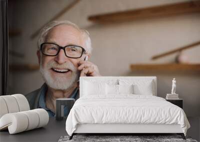 senior man talking by phone Wall mural