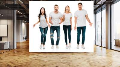 shocked young people screaming and looking at camera isolated on white Wall mural