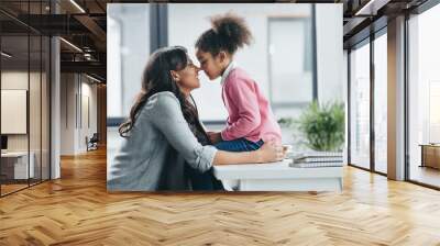 side view of african american mother able to kiss her little daughter Wall mural