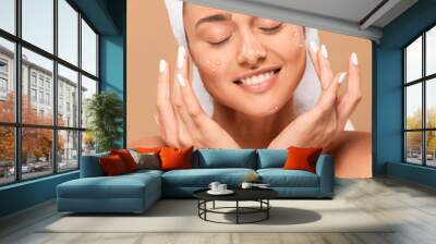 smiling naked girl with closed eyes and acne on face isolated on beige Wall mural