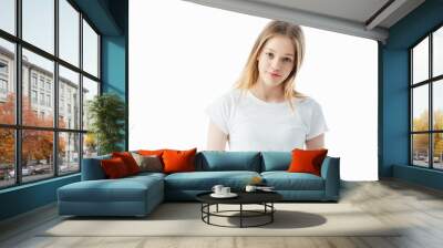 smiling teenage girl in white t-shirt looking at camera isolated on white Wall mural