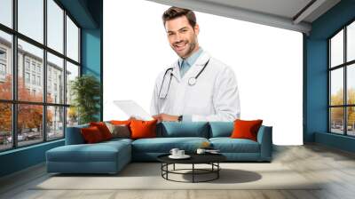 smiling young male doctor in medical coat using digital tablet isolated on white Wall mural